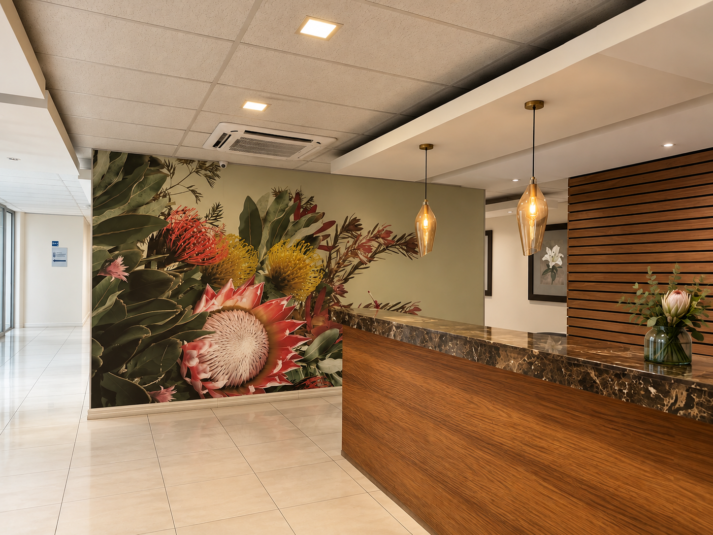 Medical Longevity Institute reception at the Centre of Advanced Medicine, with a large protea floral mural, timber desk and pendant lighting